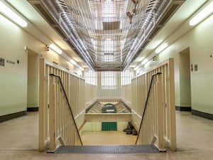 A prison corridor and stairs