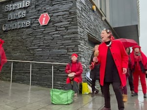 Those opposed to a proposed gold mine in Co Tyrone stage a demonstration outside the Strule Arts Centre in Omagh