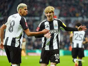 Anthony Gordon (right) celebrates after putting Newcastle ahead from the penalty spot