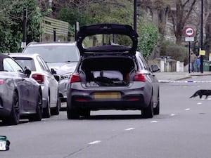 A car at the scene of a hit-and-run incident at the junction of Regent’s Park Road and Primrose Hill in north London