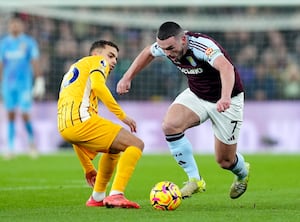 John McGinn on the ball for Aston Villa in their clash against Brighton