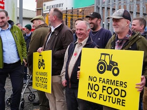 Farmers protesting with signs that read 'no farmers, no food, no future'