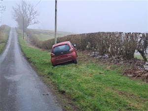 This car was seized by county officers for forensic examination.