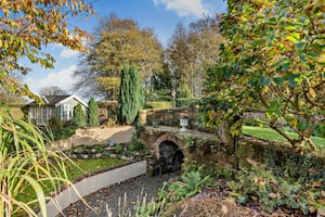 The sandstone footbridge at Grooms Cottage in Boreatton. Picture: Rightmove and Strutt & Parker.