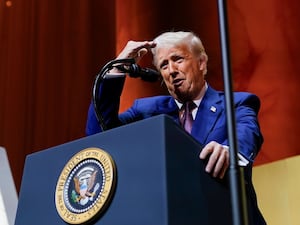 Donald Trump gesticulates during a speech