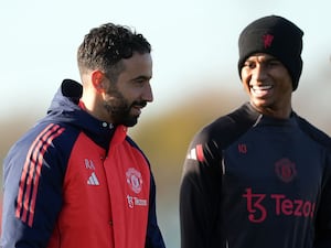 Ruben Amorim, left, talks with Marcus Rashford