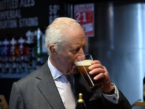 The King drinks a pint of beer