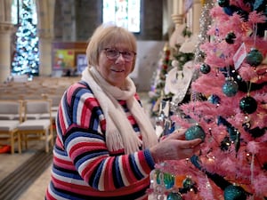 Churchwarden Jenny Davies with a line of trees at the festival. Image: Andy Compton