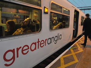 Commuters board a Greater Anglia train at Shenfield in Essex