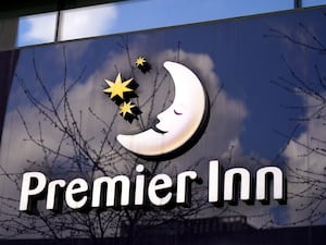 A Premier Inn sign featuring a moon and stars