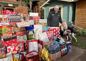 Cheryl presenting the presents to Grinshill Animal Rescue. 