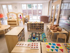 A preschool room with play equipment