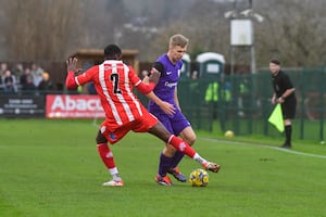 Derby loanee Harry Hawkins tries to get forward