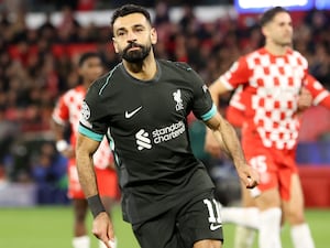 Liverpool’s Mohamed Salah celebrates after scoring the only goal in a 1-0 Champions League win at Girona