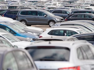 Cars lined up at a car park