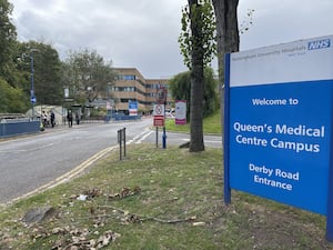 Queen's Medical Centre entrance road and sign