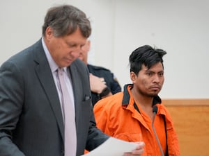 Sebastian Zapeta, right, and a lawyer in court in New York