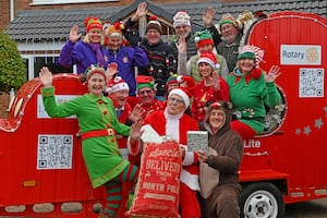 Newport Rotary Lite sleigh with Santa and elves getting ready to raise funds