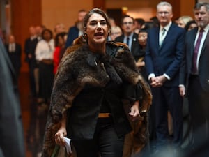 Australian senator Lidia Thorpe protests during the Ceremonial Welcome to Australia for King Charles III and Queen Camilla at Parliament House in Canberra