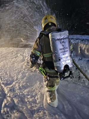 Firefighters smothered the car in a white blanket of foam. Picture: Ellesmere Fire Station