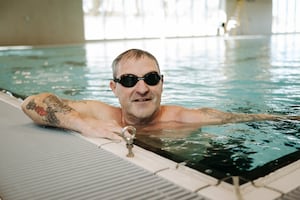 Councillor Ian Nellins in the new swimming pool. 