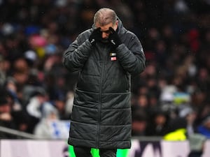 Ange Postecoglou holds his head in his hands after Bilal El Khannouss (not pictured) hit the winner