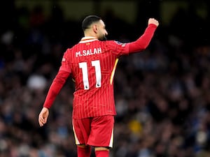 Mohamed Salah celebrates scoring the opening goal for Liverpool against Manchester City