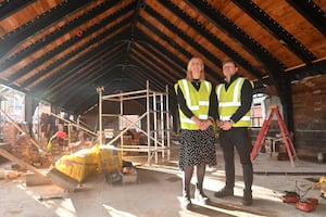 Anna with project manager Louke Glover in the upstairs of the new building which will soon be a function space