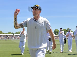 England’s Brydon Carse gestures to the crowd after taking six wickets