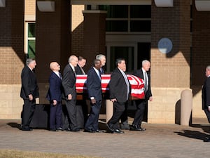 The flag-draped coffin of former president Jimmy Carter