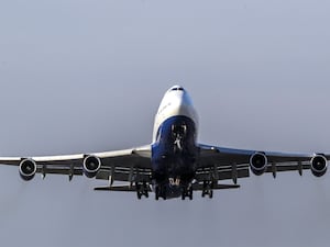 A plane landing at Heathrow airport