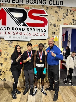 Pictured are Telford ABC’s head coaches, Lindsey Jarratt and Simon Higgins alongside the two youth champions, Mustapha Mybe and Yoan Hristov 