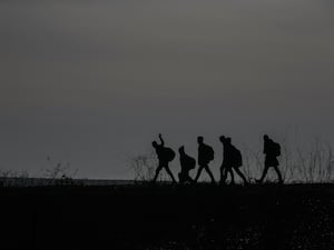 Migrants walking to enter Greece from Turkey