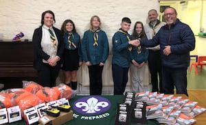 Kevin Robinson Trustee of Kington Walks presenting the equipment to 1st Kington Scouts.