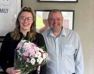 Karl Jones Regional Manager presenting Danni with her award