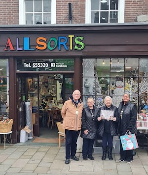 Mayor Roy Aldcroft (left) presenting All Sorts with second prize.