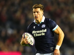 Huw Jones playing for Scotland