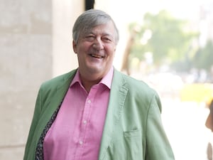 Sir Stephen Fry outside BBC HQ in London