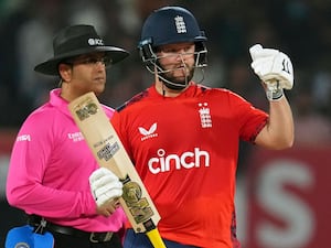 Ben Duckett puts his left thumb up to celebrate his half-century