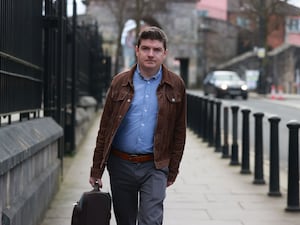 Former Sinn Fein press officer Michael McMonagle arrives at Derry Courthouse in Londonderry