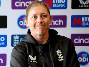 Heather Knight smiles during an England press conference