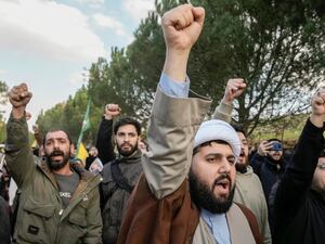 Residents with their fists in the air