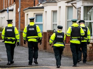 PSNI officers patrol the student area of Belfast (PA)