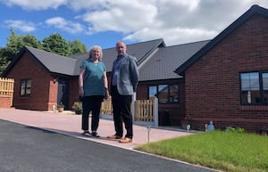 Sam Hine, who will be stepping down as chair of Shropshire Rural Housing Association, and chief executive, John Green. Picture: Shropshire Rural Housing Association 