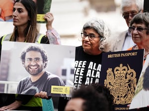 Laila Soueif (centre right), the mother of the 40-year-old British-Egyptian writer Alaa Abd el-Fattah, takes part in a vigil for him