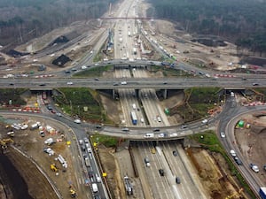 An aerial view of traffic using Junction 10 of the M25 in Surrey