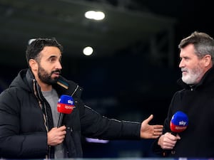 Ruben Amorim talks to Roy Keane