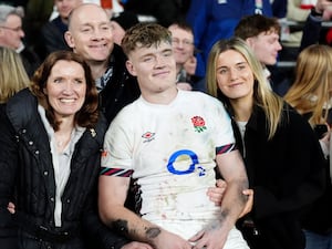 Fin Smith poses with his family