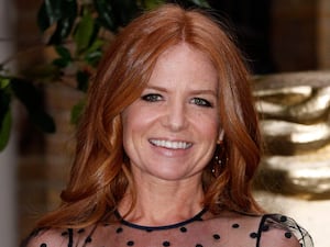 Patsy Palmer smiles at the camera