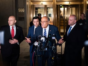 Rudy Giuliani speaking to the media